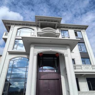 新乡白麻别墅外墙干挂石材效果示例