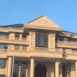 新乡黄金麻别墅外墙干挂石材效果示例