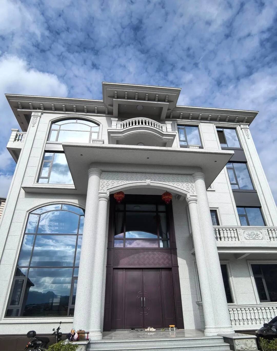 新乡白麻别墅外墙干挂石材效果示例