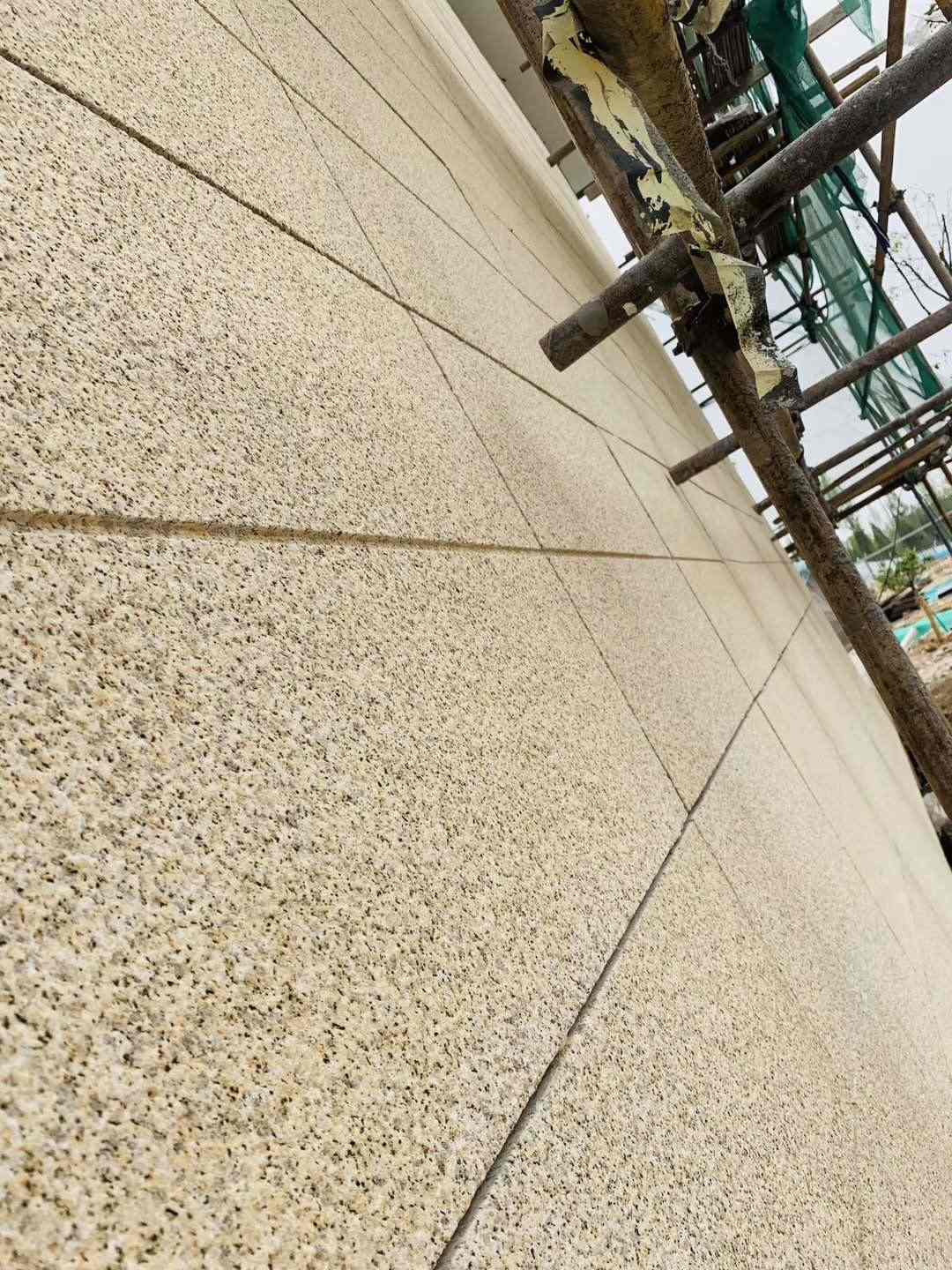 新乡 黄金麻花岗岩荔枝面外墙干挂石材效果示例